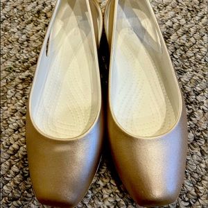 Brand new. Gold, ballerina flats